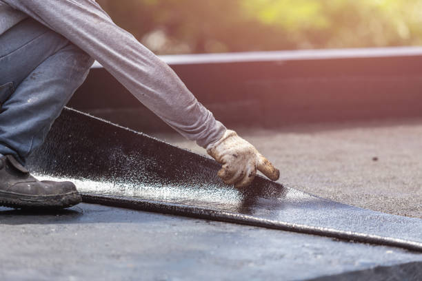 Professional Basement Waterproofing technician working in Mendota, MN